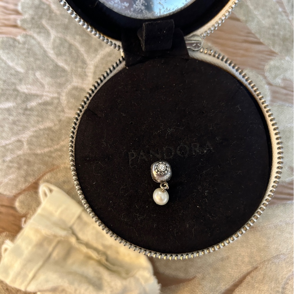 Hanging pearl charm